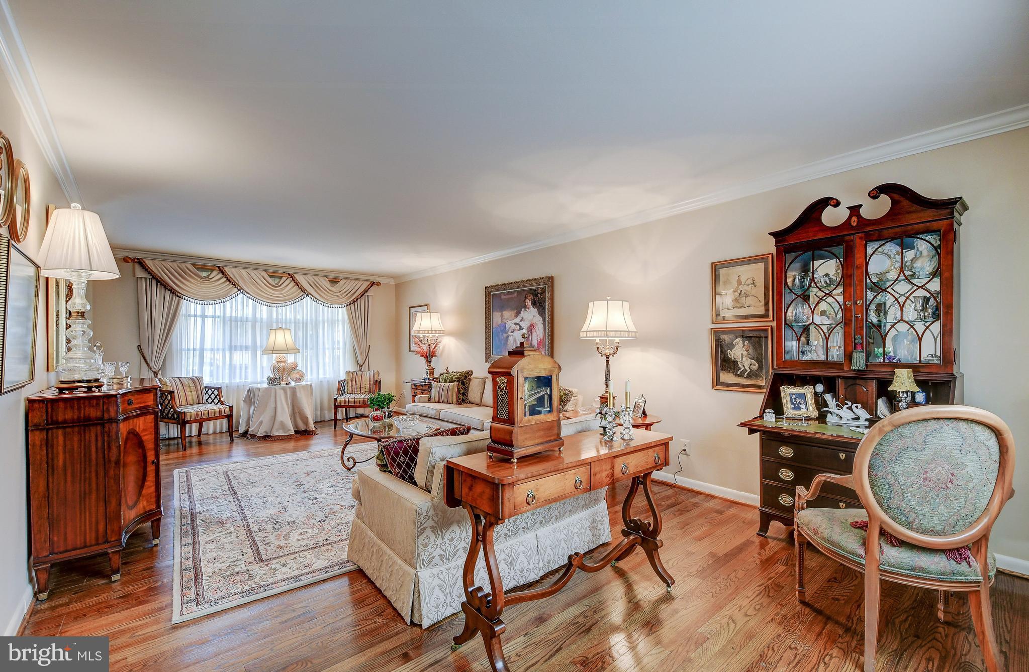 7202 Denberg Road Baltimore, MD 21209 - Photo 7 of 32 LIVING ROOM WITH HARDWOOD FLOORS