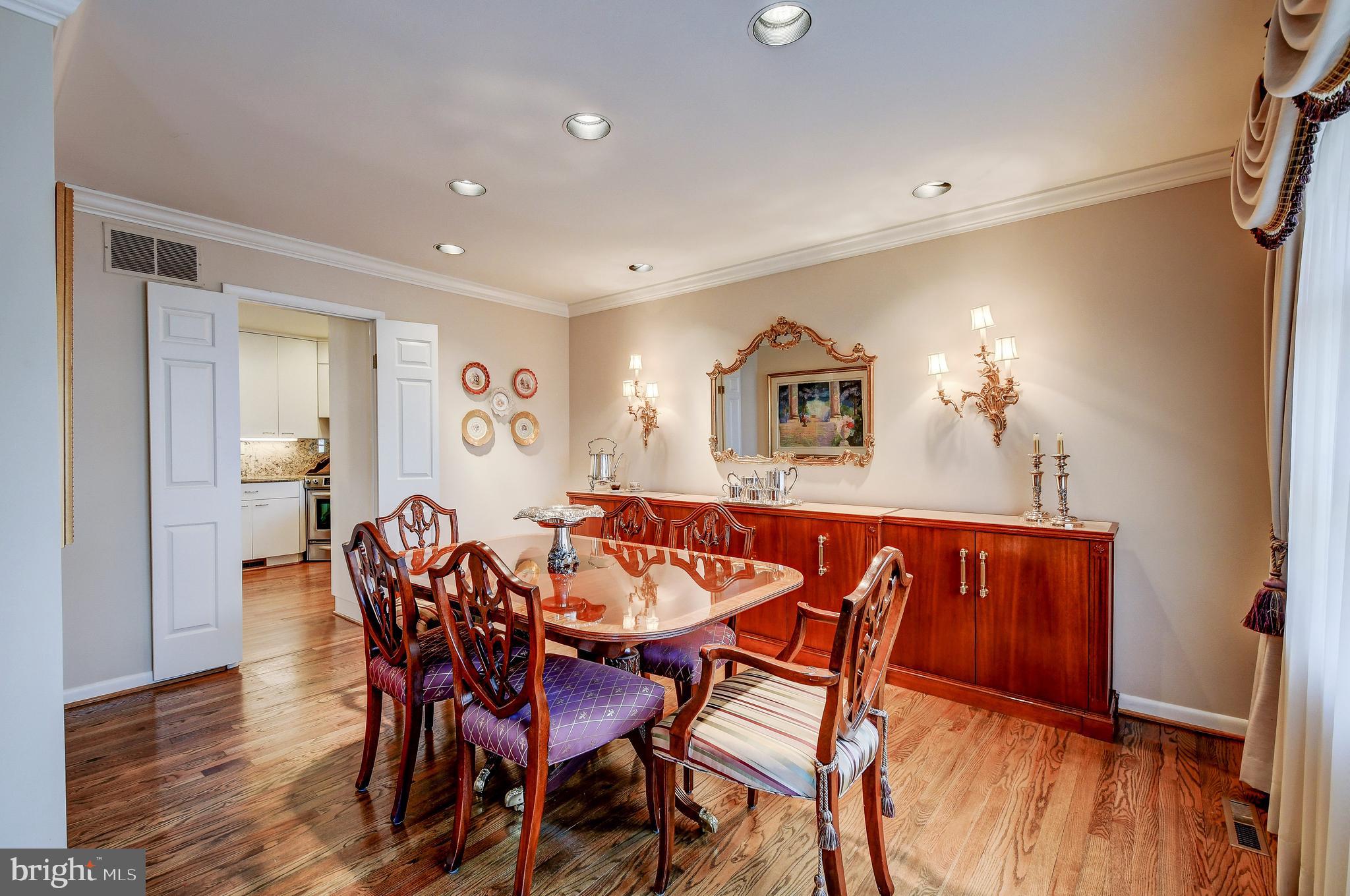 7202 Denberg Road Baltimore, MD 21209 - Photo 9 of 32 DINING ROOM W/ HARDWOOD FLOORS & CROWN MOLDING