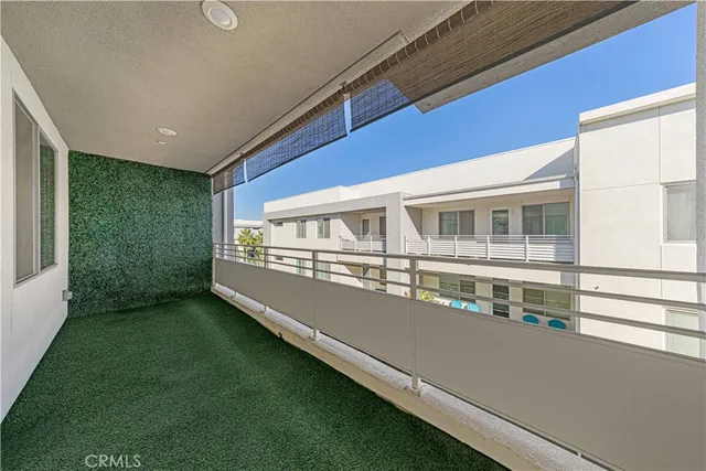 a view of a large building with a big yard