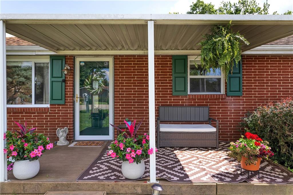212 Seanor Road Irwin, PA 15642 - Photo 5 of 33 Covered Front Patio at the Entry - Warm and Inviting - Perfect Place for Your Morning Coffee.