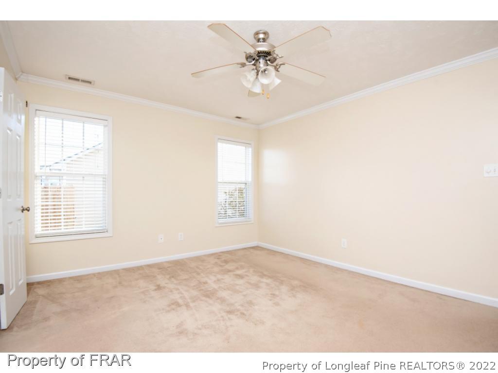 1957 Yellowbrick Road Fayetteville, NC 28314 - Photo 17 of 27 a view of an empty room with a window