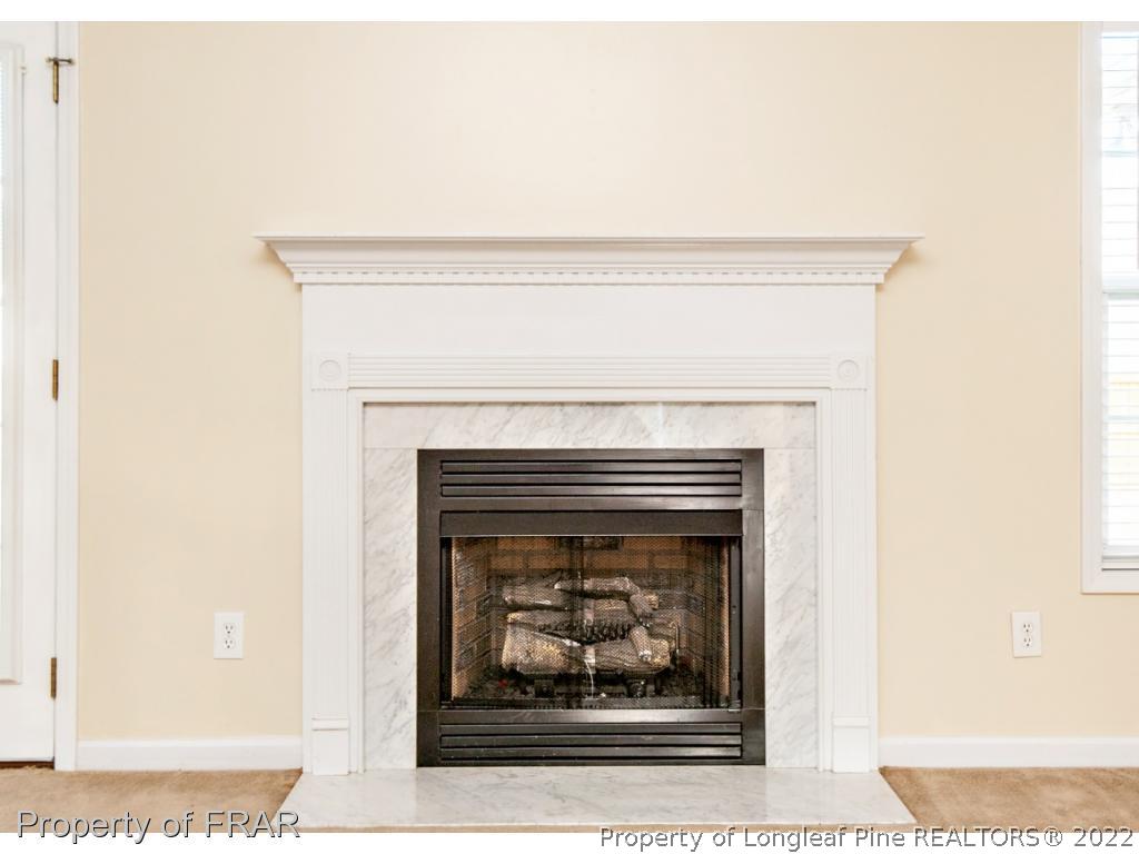 1957 Yellowbrick Road Fayetteville, NC 28314 - Photo 7 of 27 a close view of a fireplace
