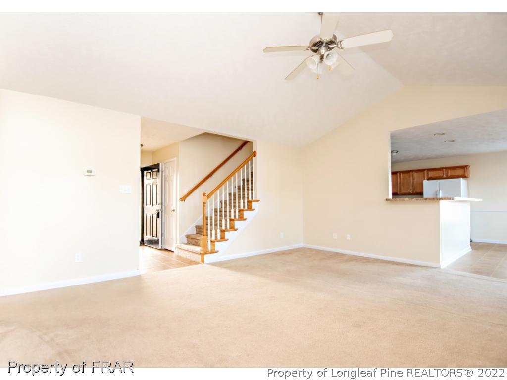 1957 Yellowbrick Road Fayetteville, NC 28314 - Photo 8 of 27 a view of entryway and hall with a fan