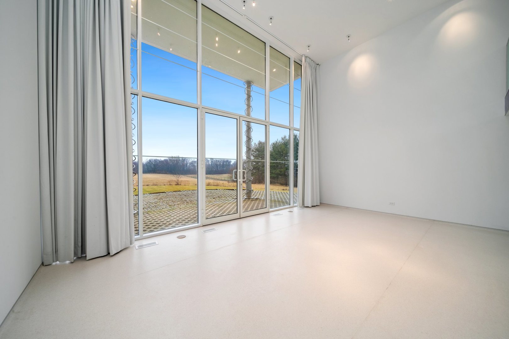 18303 Lincoln Road Harvard, IL 60033 - Photo 12 of 35 a view of an empty room with a sliding door