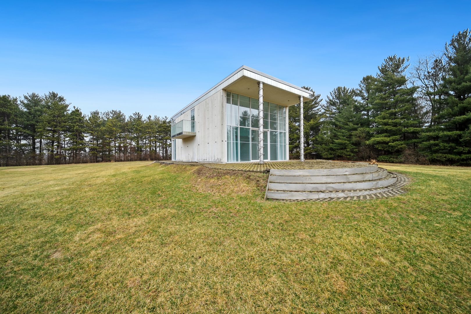 18303 Lincoln Road Harvard, IL 60033 - Photo 3 of 35 a swimming pool with trees in the background