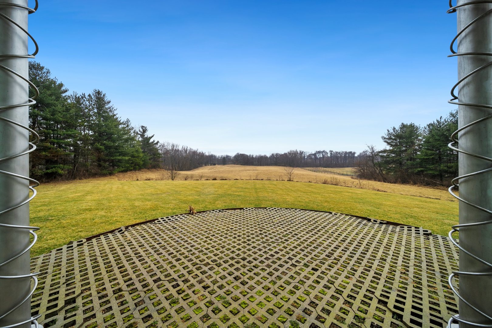 18303 Lincoln Road Harvard, IL 60033 - Photo 7 of 35 a view of a swimming pool and an ocean view
