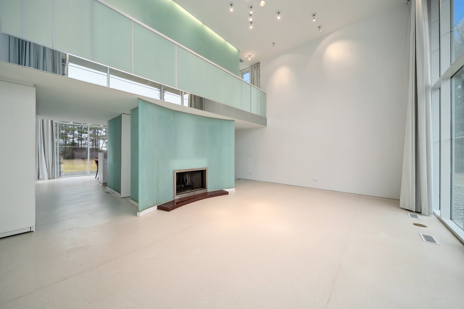 18303 Lincoln Road Harvard, IL 60033 - Photo 9 of 35 an empty room with fireplace and a window