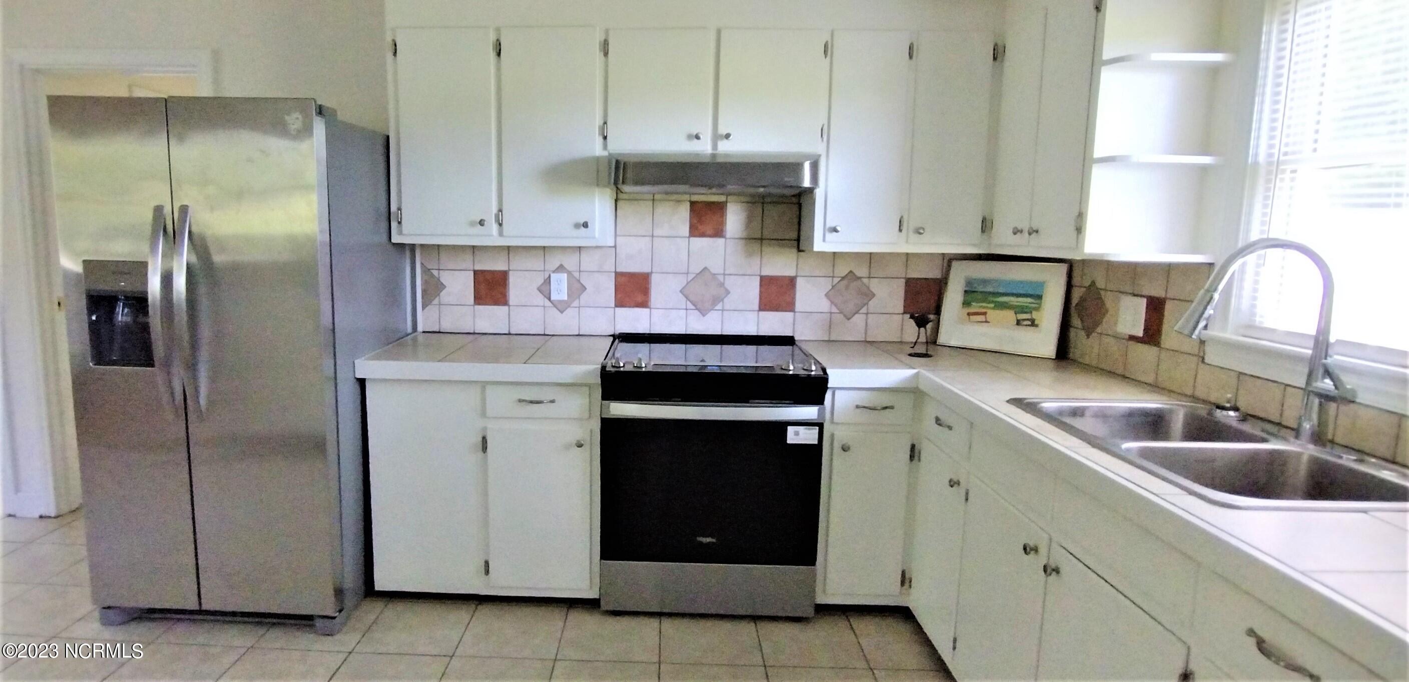 1051 White Road Williamston, NC 27892 - Photo 12 of 56 new stainless range and refrigerator