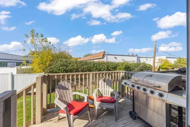 a balcony with chairs
