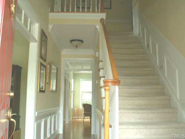 7705 Wilderness Road Raleigh, NC 27613 - Photo 3 of 10 a view of a entryway door