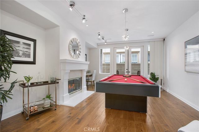 a living room with a fireplace furniture and a fireplace