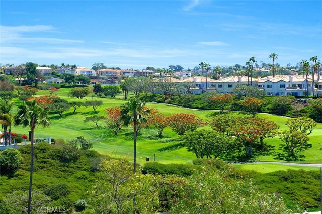 a view of a lake with a city