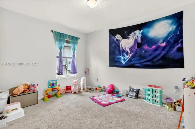 a bedroom with furniture and a couch