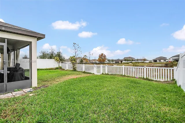 a view of a garden with a houses