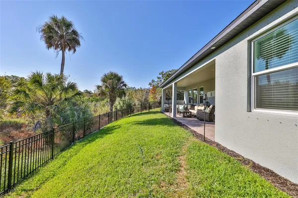 a view of a porch with a backyard