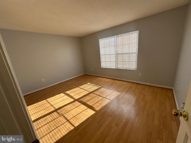 110 Prosperity Avenue Southeast, Unit D Leesburg, VA 20175 - Photo 13 of 25 a view of an empty room and window