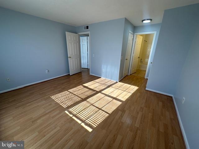 110 Prosperity Avenue Southeast, Unit D Leesburg, VA 20175 - Photo 15 of 25 a view of wooden floor
