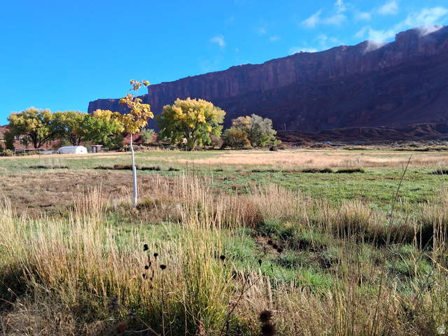 437 West Rimrock Lane, Unit 437 Moab, UT 84532 - Photo 3 of 9 View of mountain background with rural landscape