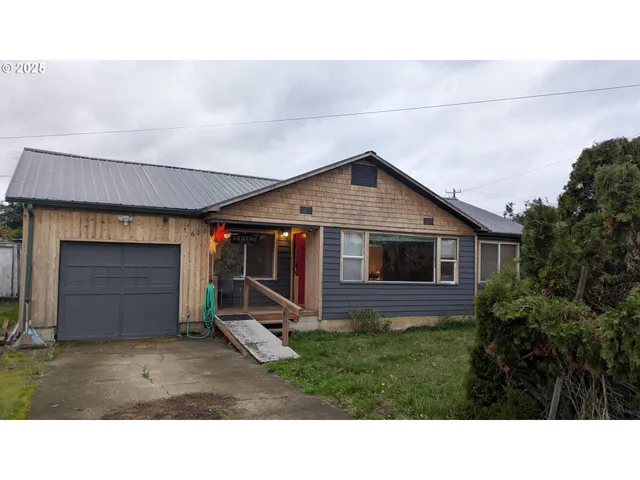 a house view with a backyard space
