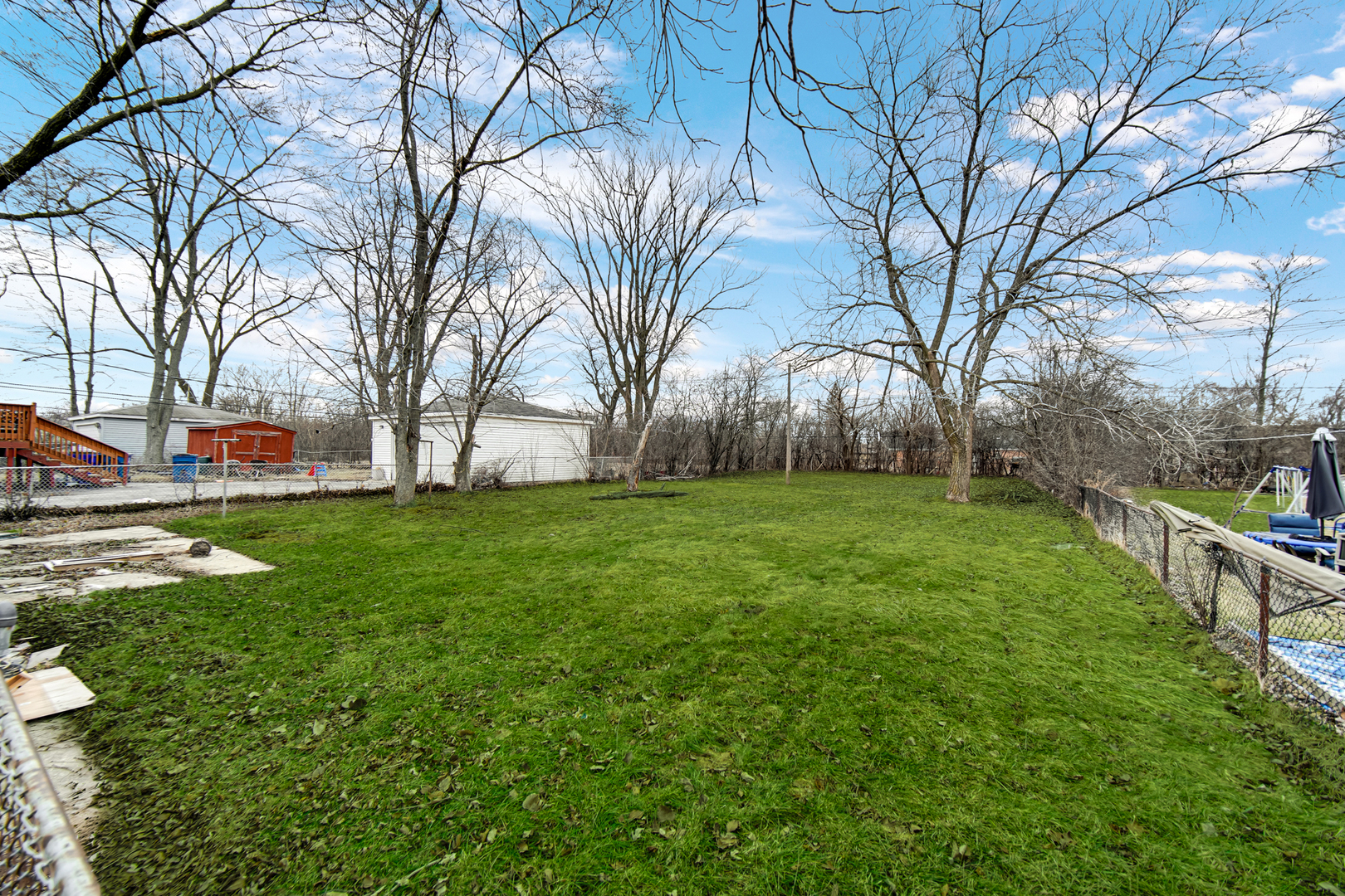 341 Boston Street North Chicago Heights, IL 60411 - Photo 2 of 13 a view of a park with large trees