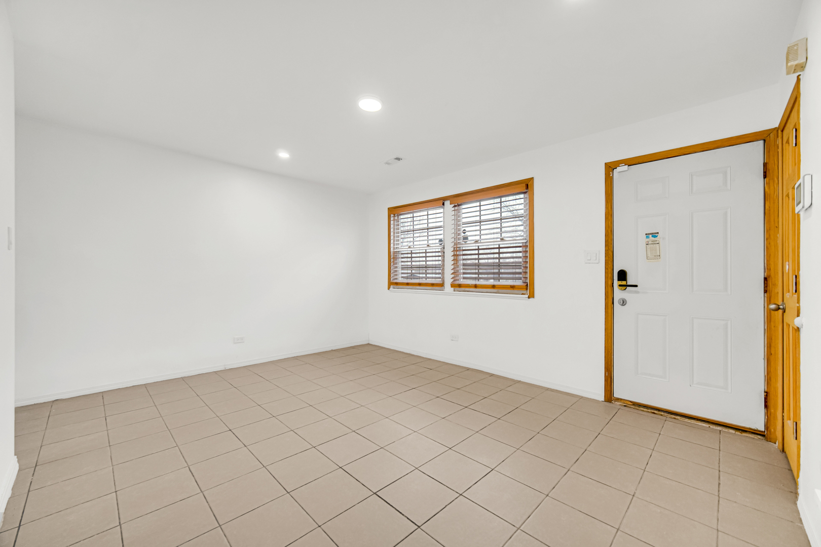 341 Boston Street North Chicago Heights, IL 60411 - Photo 10 of 13 an empty room with windows