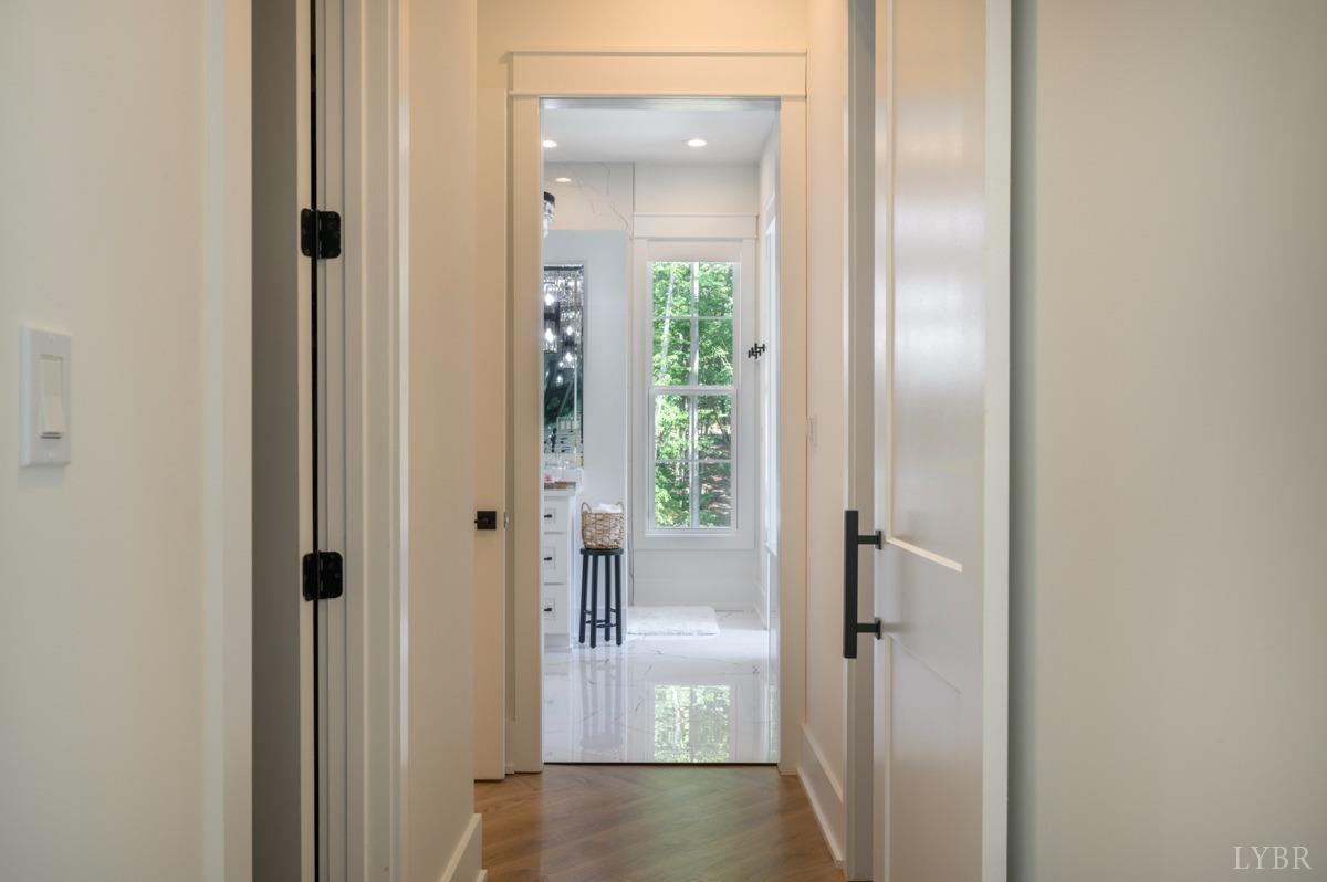 12175 Forest Road Forest, VA 24551 - Photo 25 of 75 a view of a bathroom from a hallway with toilet