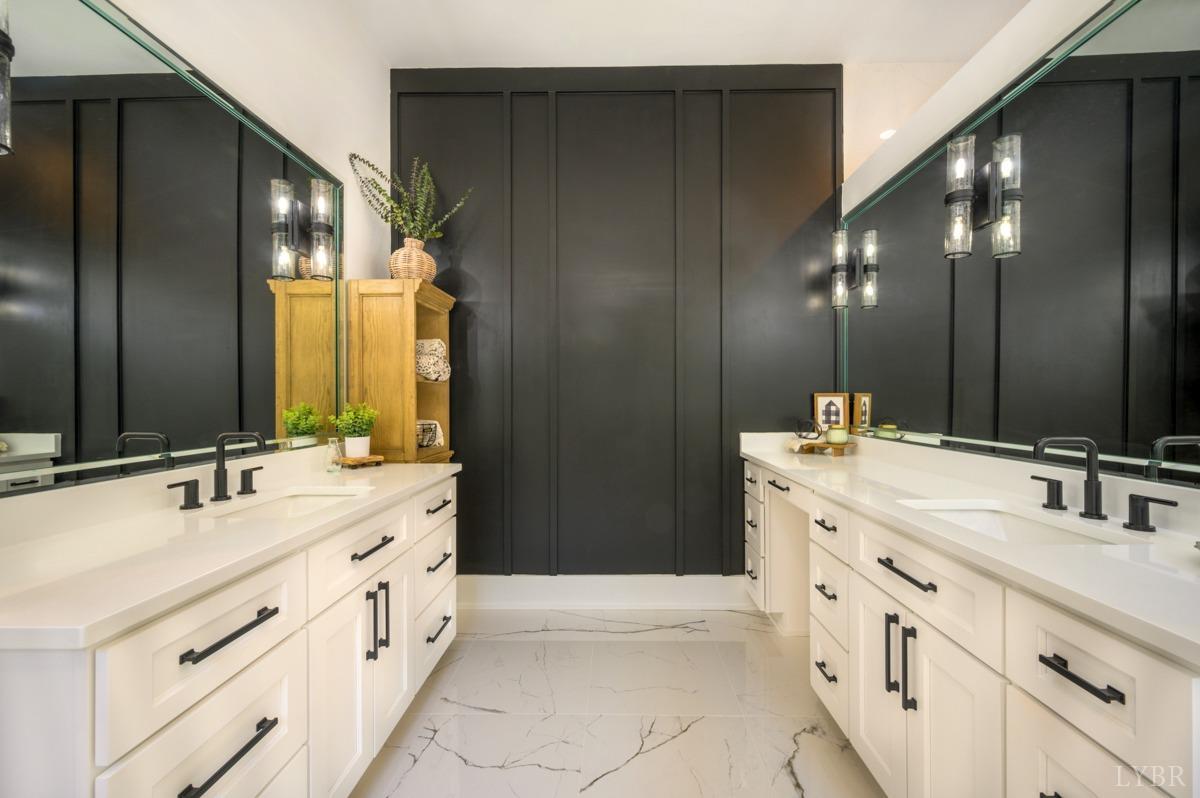 12175 Forest Road Forest, VA 24551 - Photo 30 of 75 a bathroom with a double vanity sink mirror and double