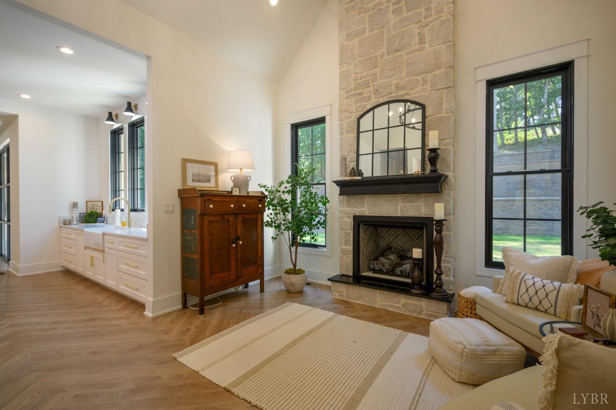 12175 Forest Road Forest, VA 24551 - Photo 31 of 75 a living room with furniture and a fireplace