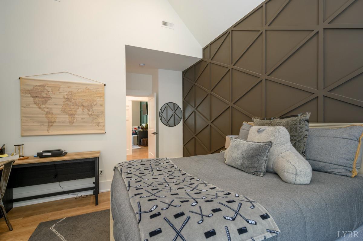 12175 Forest Road Forest, VA 24551 - Photo 39 of 75 a bedroom with a bed and wooden floor