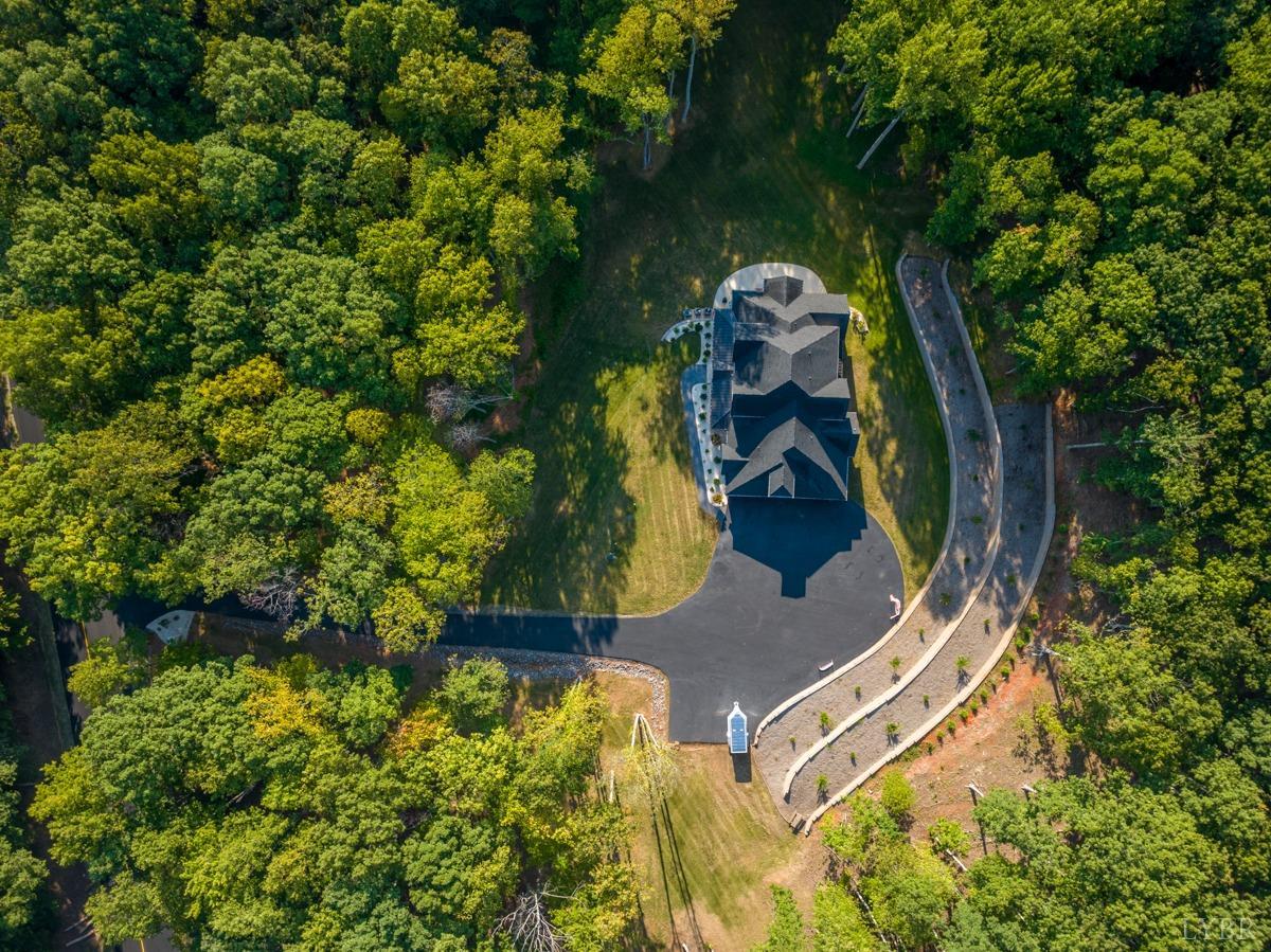 12175 Forest Road Forest, VA 24551 - Photo 4 of 75 an aerial view of a house with a yard