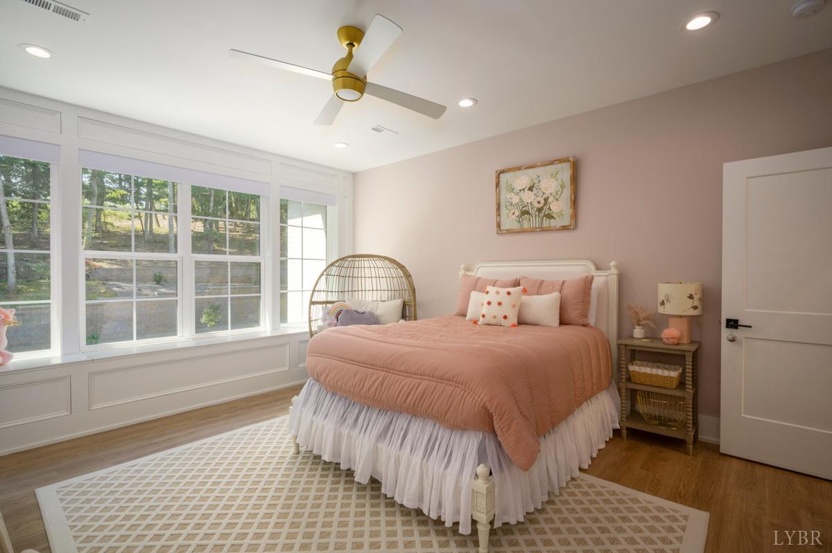12175 Forest Road Forest, VA 24551 - Photo 41 of 75 a bedroom with a bed and wooden floor