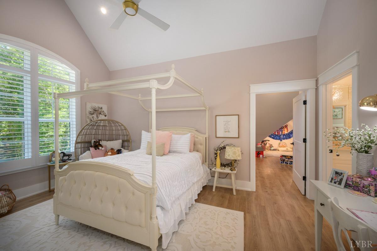 12175 Forest Road Forest, VA 24551 - Photo 44 of 75 a bedroom with a large bed couch and a window