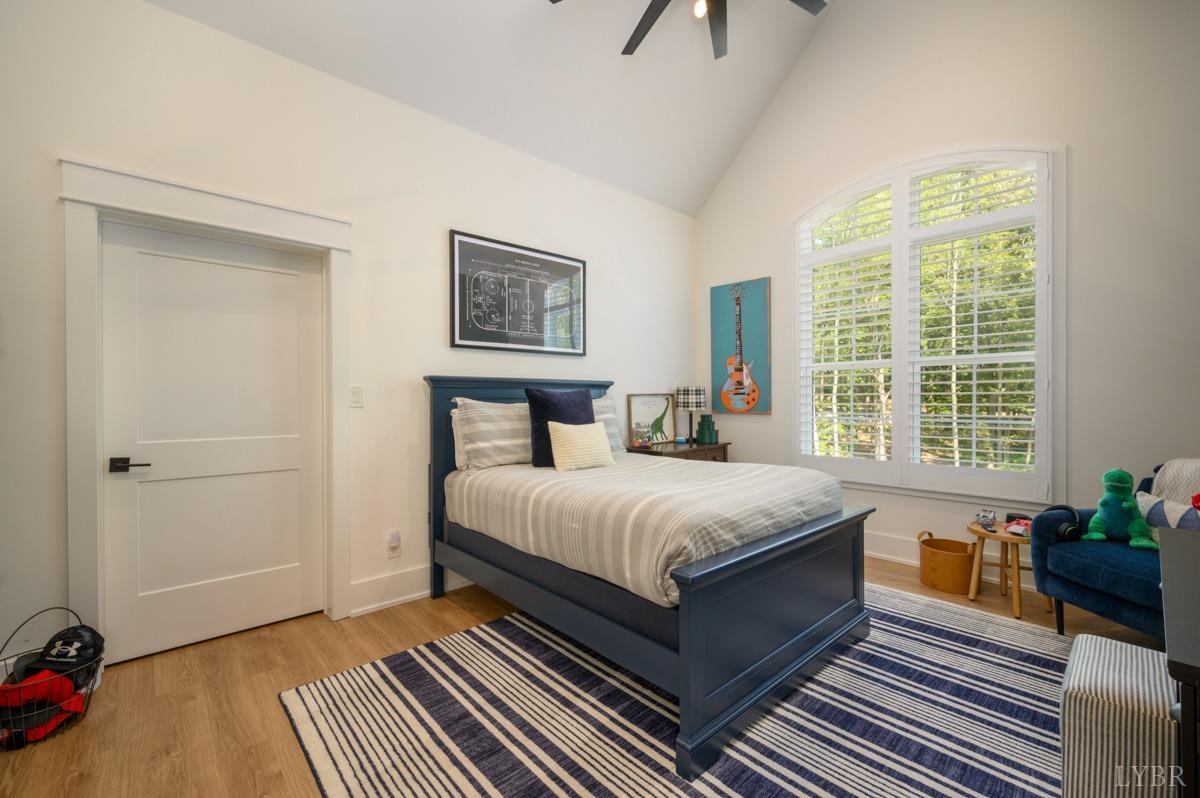 12175 Forest Road Forest, VA 24551 - Photo 51 of 75 a bedroom with a bed wooden floor and window