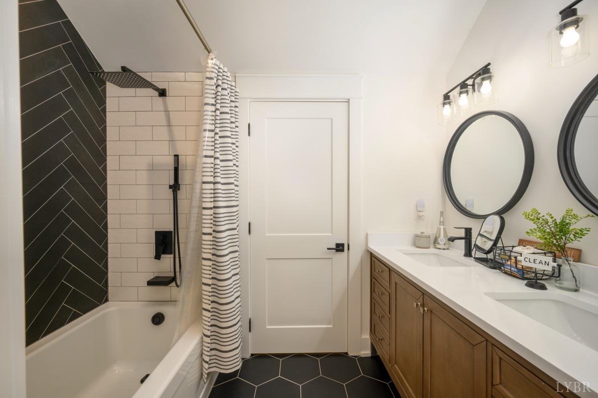 12175 Forest Road Forest, VA 24551 - Photo 55 of 75 a bathroom with a sink a toilet and shower