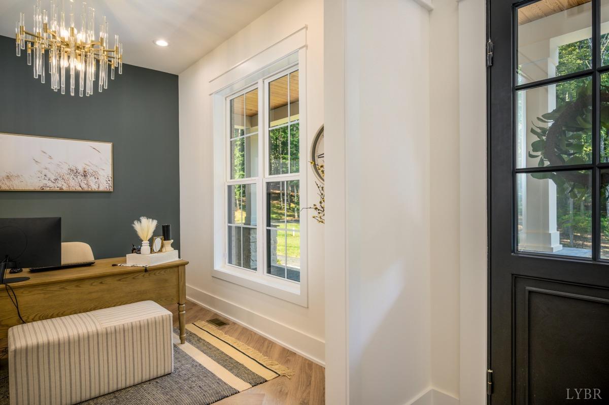 12175 Forest Road Forest, VA 24551 - Photo 7 of 75 a living room with furniture and a window