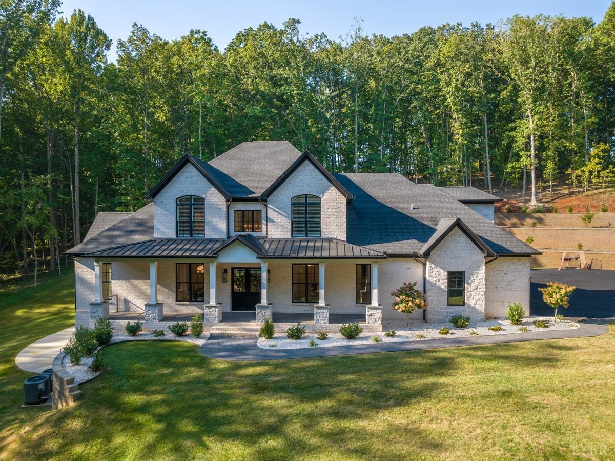 12175 Forest Road Forest, VA 24551 - Photo 71 of 75 a front view of a house with swimming pool having outdoor seating