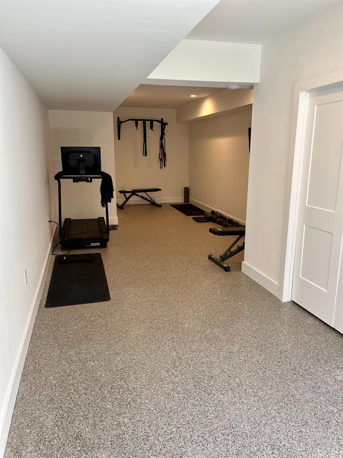 12175 Forest Road Forest, VA 24551 - Photo 75 of 75 a room with gym equipment and a view of living room