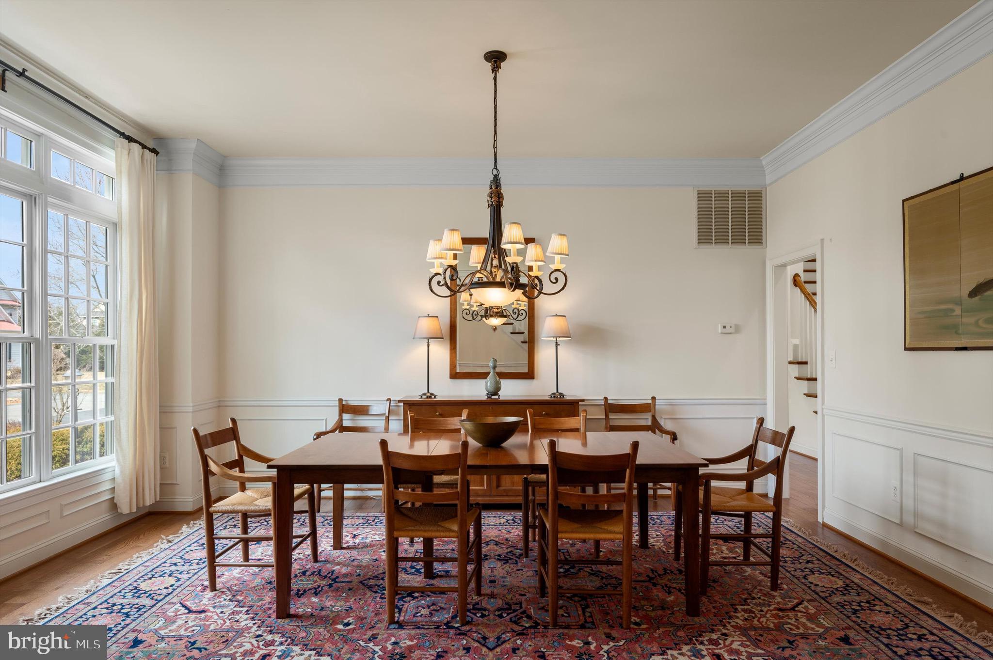 20880 Eckbo Drive Leesburg, VA 20175 - Photo 5 of 10 a dining room with furniture window and wooden floor