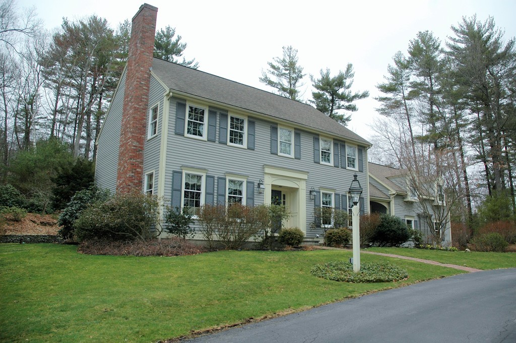 25 Chandler Road Boxford, MA 01921 - Photo 1 of 30 a front view of a house with garden