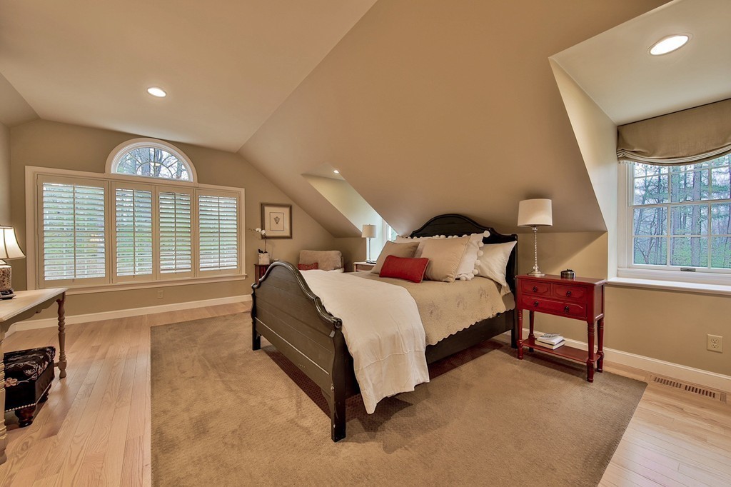 25 Chandler Road Boxford, MA 01921 - Photo 15 of 30 a spacious bedroom with a bed and a large window