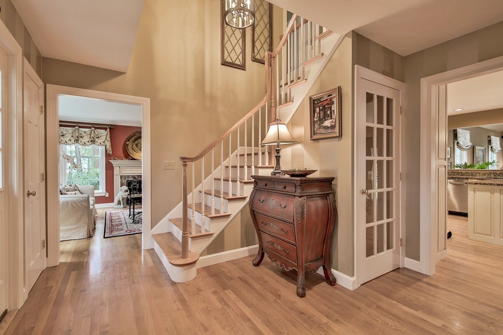 25 Chandler Road Boxford, MA 01921 - Photo 3 of 30 a view of entryway with wooden floor and windows