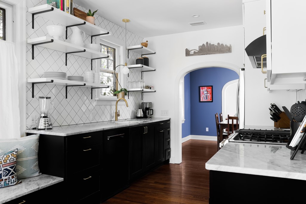 3812 Duval Street Austin, TX 78751 - Photo 12 of 22 a kitchen with cabinets a sink and appliances