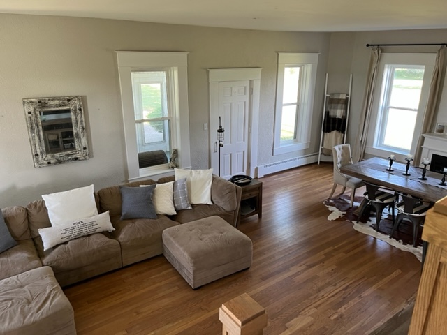 14676 East Twombly Road Rochelle, IL 61068 - Photo 12 of 63 a living room with furniture and wooden floor