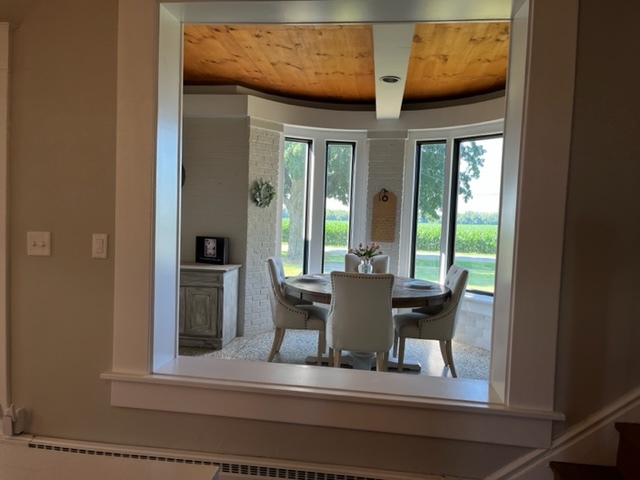 14676 East Twombly Road Rochelle, IL 61068 - Photo 26 of 63 a view of a dining room with furniture and window