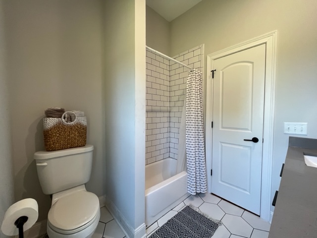 14676 East Twombly Road Rochelle, IL 61068 - Photo 37 of 63 a bathroom with a toilet and shower