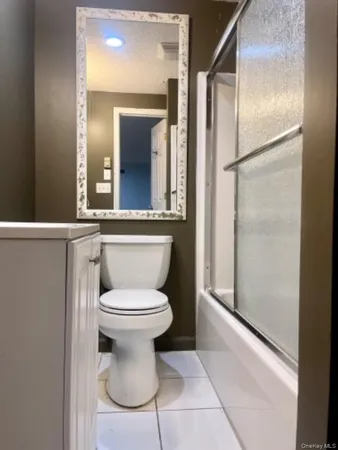 a bathroom with a toilet and a sink