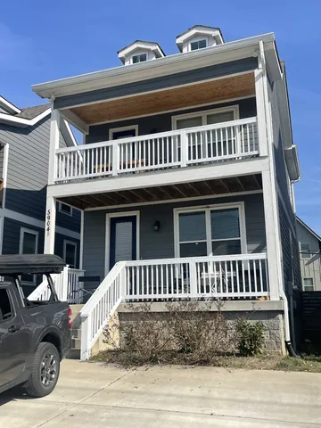 a view of a house with a deck