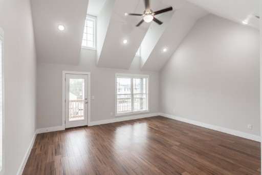 5904 B Morrow Road Nashville, TN 37209 - Photo 11 of 21 an empty room with wooden floor fan and windows