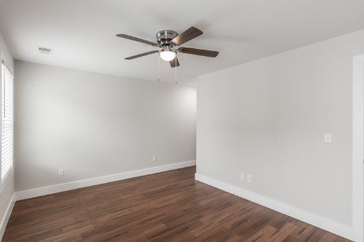5904 B Morrow Road Nashville, TN 37209 - Photo 21 of 21 a view of an empty room with wooden floor and a window