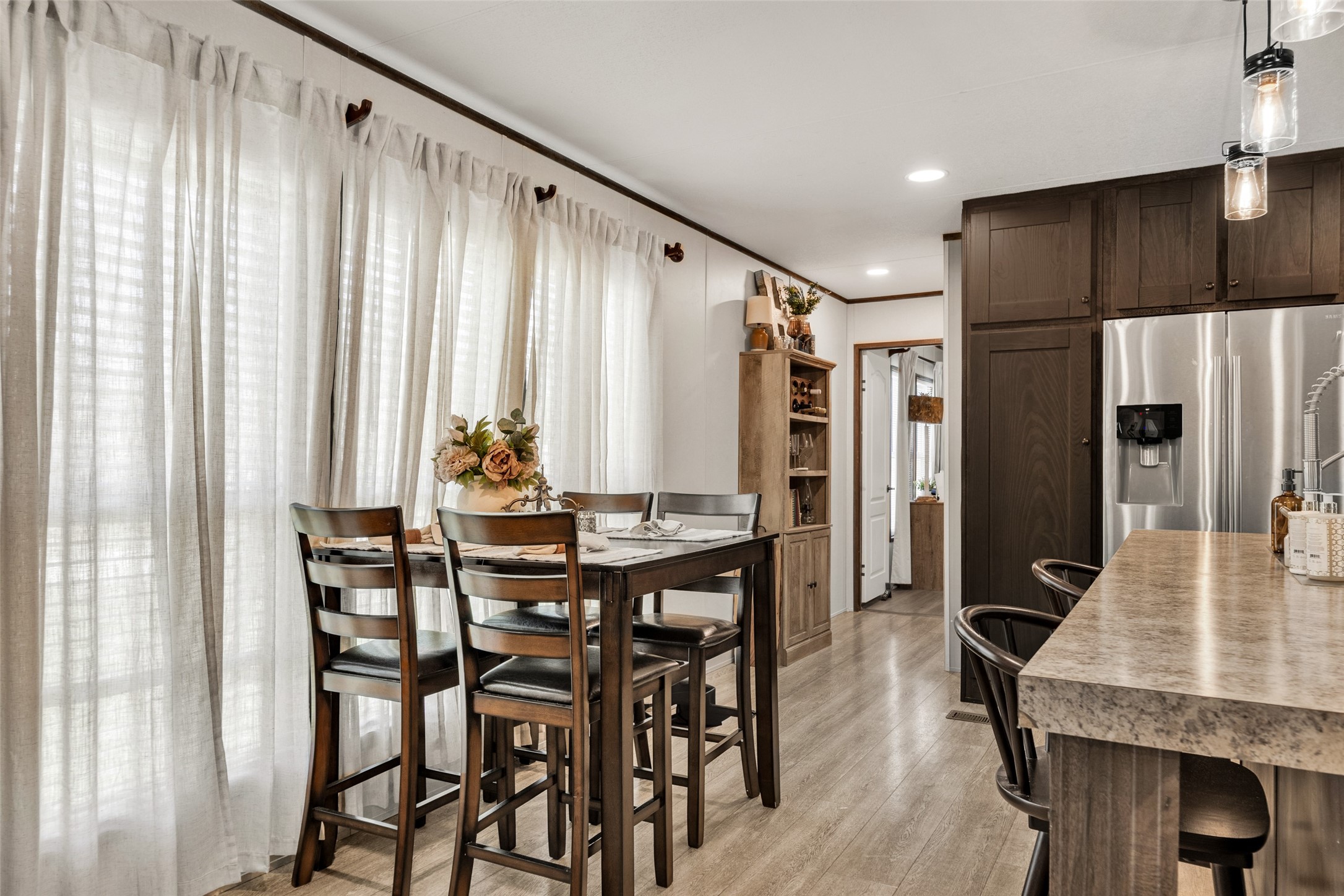 3133 Henderson Road Navasota, TX 77868 - Photo 11 of 26 a view of a dining room with furniture and window
